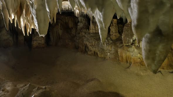 Area deep inside  underground  cavern 3840X2160 UltraHD  footage - Tilting on old cave formations of