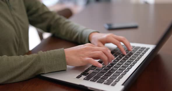 Woman work on computer at home