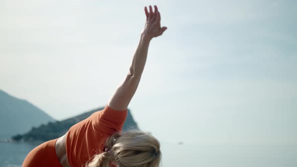 Workout at Sea Female Yoga Doing Stretching with Stunning Water View