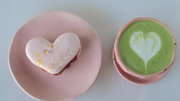 Heartshaped Cake and Matcha with Latte Art in a Cafe on 14Th February Valentine's Lovely Date Ideas