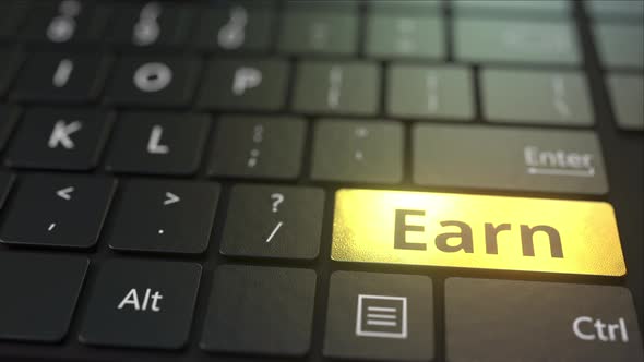 Black Computer Keyboard and Gold Earn Key alt