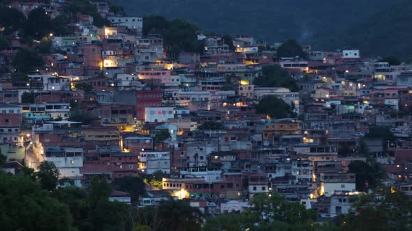 Favela lights turn on time lapse. Itararé, São Benedito, Leitão da Silva, Vitória, Espírito Santo, B