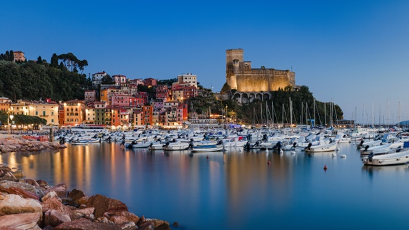 Panoramic Day to Night Sunset Time Lapse of Porto di Lerici and Castello di Lerici with many boats