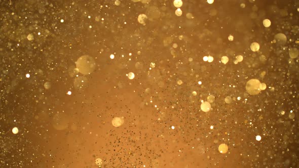 Golden Glitter Background in Super Slow Motion at 1000Fps