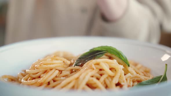 Woman Eating Pasta With Sauce Bolognese