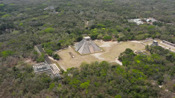 Aerial Tilt Up Shot of Old Maya Town Surrounded By Endless Forest