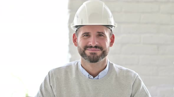 Portrait of Successful Young Engineer Smiling at Camera 