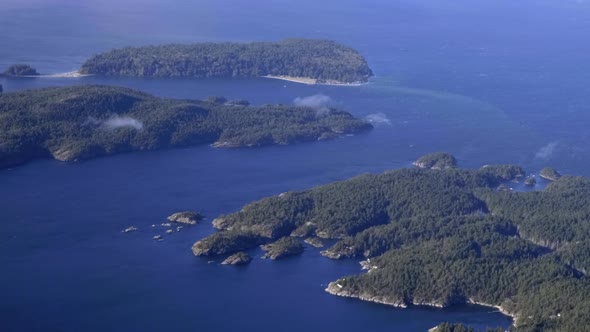 Flying Above The Beautiful Islands Of Texada And Lasqueti With Lush Green Vegetation Surrounded By B