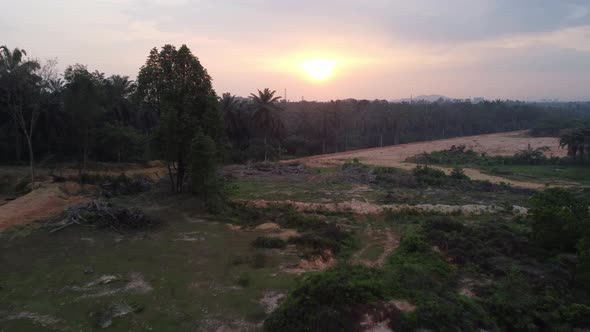 Drone view sunset over land clearing