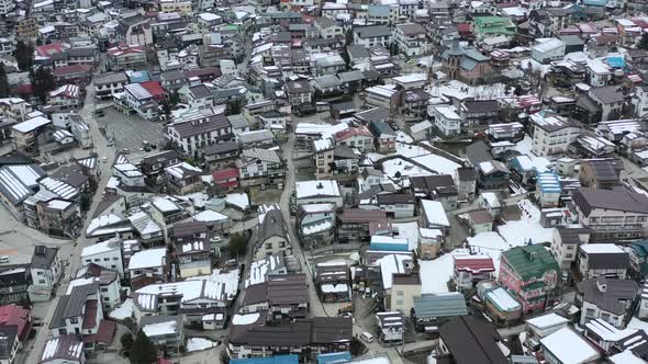 dense populated residential apartments in Japanese village of nozawa onsen, aerial