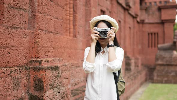 Woman visiting ancient temple