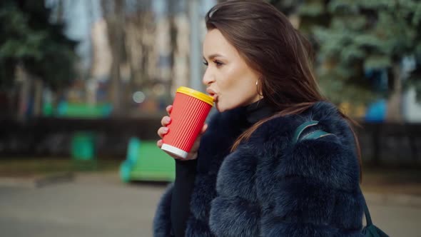 Happy Woman With Cup of Coffee