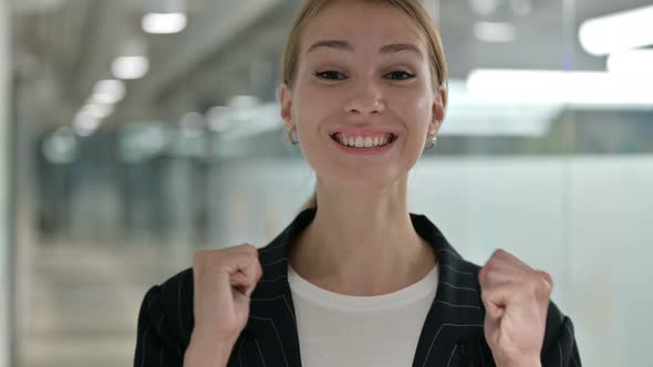 Portrait of Excited Businesswoman Celebrating Success