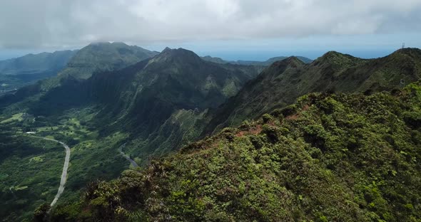 Drone 4000ft up in the air in Oahu getting a shot of the mountain top trail of the Stairway to Heave