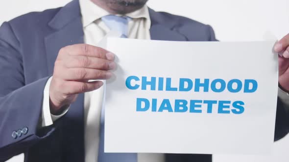 Businessman Posts Sign On Window Childhood Diabetes