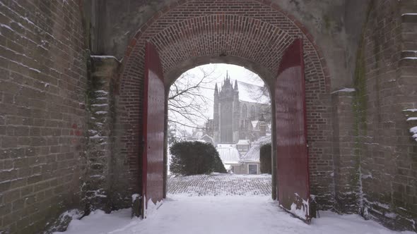 Burcht van Leiden city gate in winter snow, walking point-of-view POV