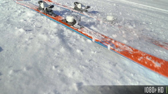 Skis Falling on Snow in Slow Motion