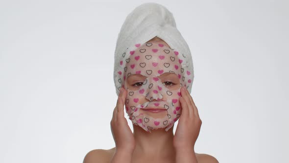 Child Girl Applying Cosmetic Moisturizing Face Mask Teenager Facial Skin Care Natural Cosmetics