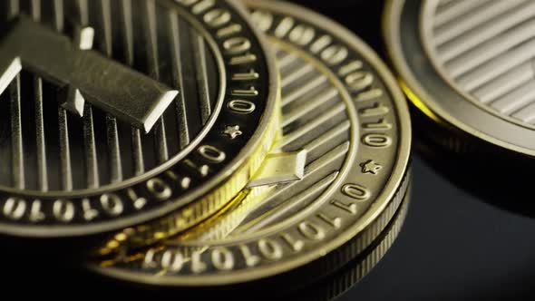 Rotating shot of Bitcoins (digital cryptocurrency) - BITCOIN LITECOIN 