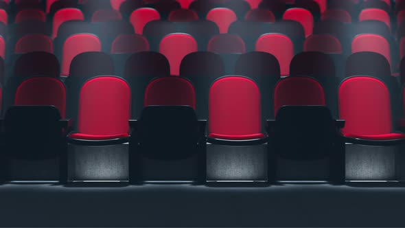 Rows of chairs in a cinema hall. Social distance. Movie theatre during COVID-19