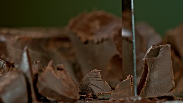 Super Slow Motion Shot of Cutting Raw Chocolate Chunk at 1000 Fps