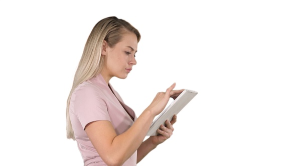 Girl holding digital tablet searching for something on