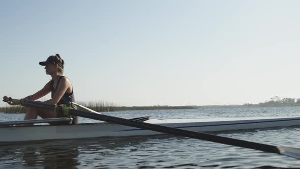 Female rowers training on a river