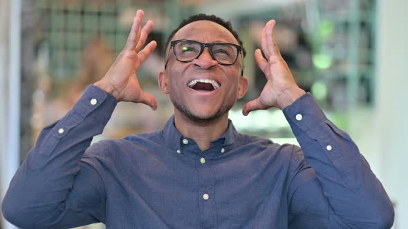 Upset Young African Man Shouting, Screaming