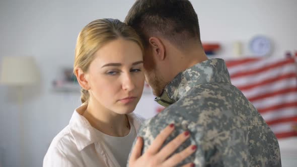 Sad Woman Embracing Soldier Leaving Home, Farewell Before Military Service