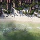 Aerial View of Waves Crushing in Tulum Beach Infront of an Exclusive Touristic Resort. - VideoHive Item for Sale