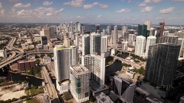 Miami River seen between Downtown Miami and Brickell. 5k amazing drone footage