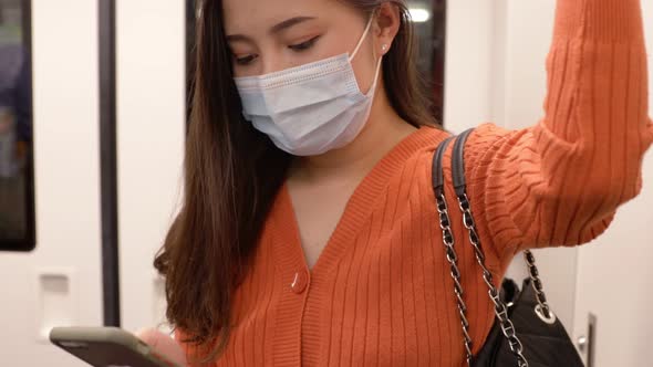 Young asian woman cover mouth , wear medical face mask to protect viruses