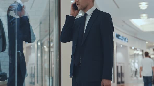 Young businessman with bag