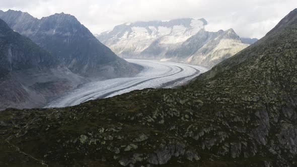 Aerial reveals view over Aletsch glacier, in the evening Switzerland