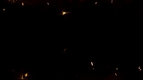 Sparkling Splashes of Bengal Fires on Black Background