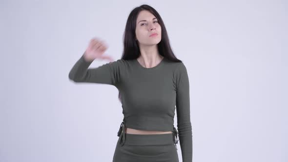 Angry Young Woman Giving Thumbs Down