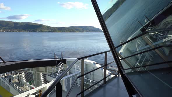 Ferry Hydra sailing to Hjelmeland Norway - Seaview outside wheelhouse window with reflections - Worl