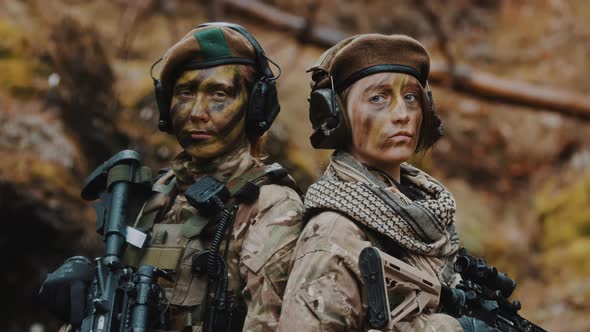 Career in Army for Women Concept  Portrait of Two Female Soldiers During the Modern War Operation