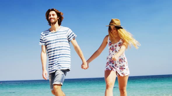 Couple enjoying together at beach