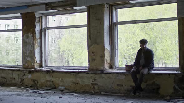 Arab Man in Abandoned Building