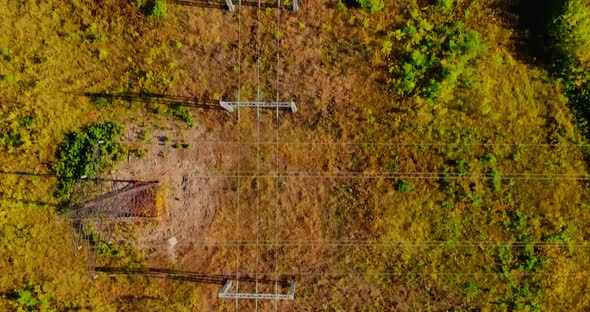 Aerial View of a Copter Flying Towards a Solar Energy Processing Station, Modern Technology. Modern