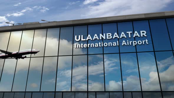 Airplane landing at Ulaanbaatar Mongolia airport mirrored in terminal