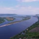 Aerial View of Natural Landscape with Wide River Island and Mountains in Horizon - VideoHive Item for Sale
