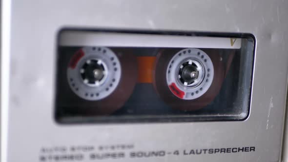 Audio Tape. Vintage Tape Recorder Plays Audio Cassette Inserted Therein