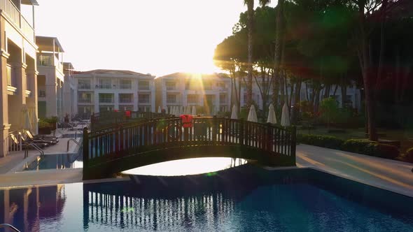 Outdoor Swimming Pool and Hotel at Sunrise