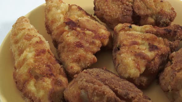 Fried chicken on a plate. Crispy fried chicken.