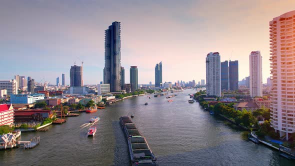 4K UHD : Bangkok River drone view. Flying over the Chao Phraya River