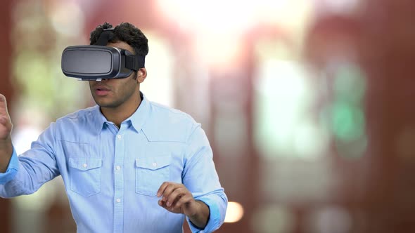 Indian Man Wearing Virtual Reality Goggles