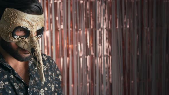 Mysterious Handsome Bearded Cuban Businessman in a Beautiful Traditional Venetian Mask Over Shiny