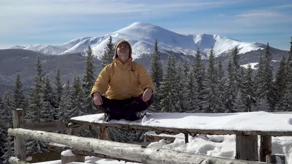 A Man Sitting in Lotus Posture